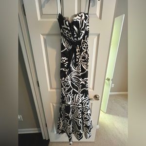 Black and white mermaid or trumpet style strapless gown